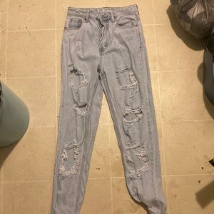 High waisted light wash ripped jeans